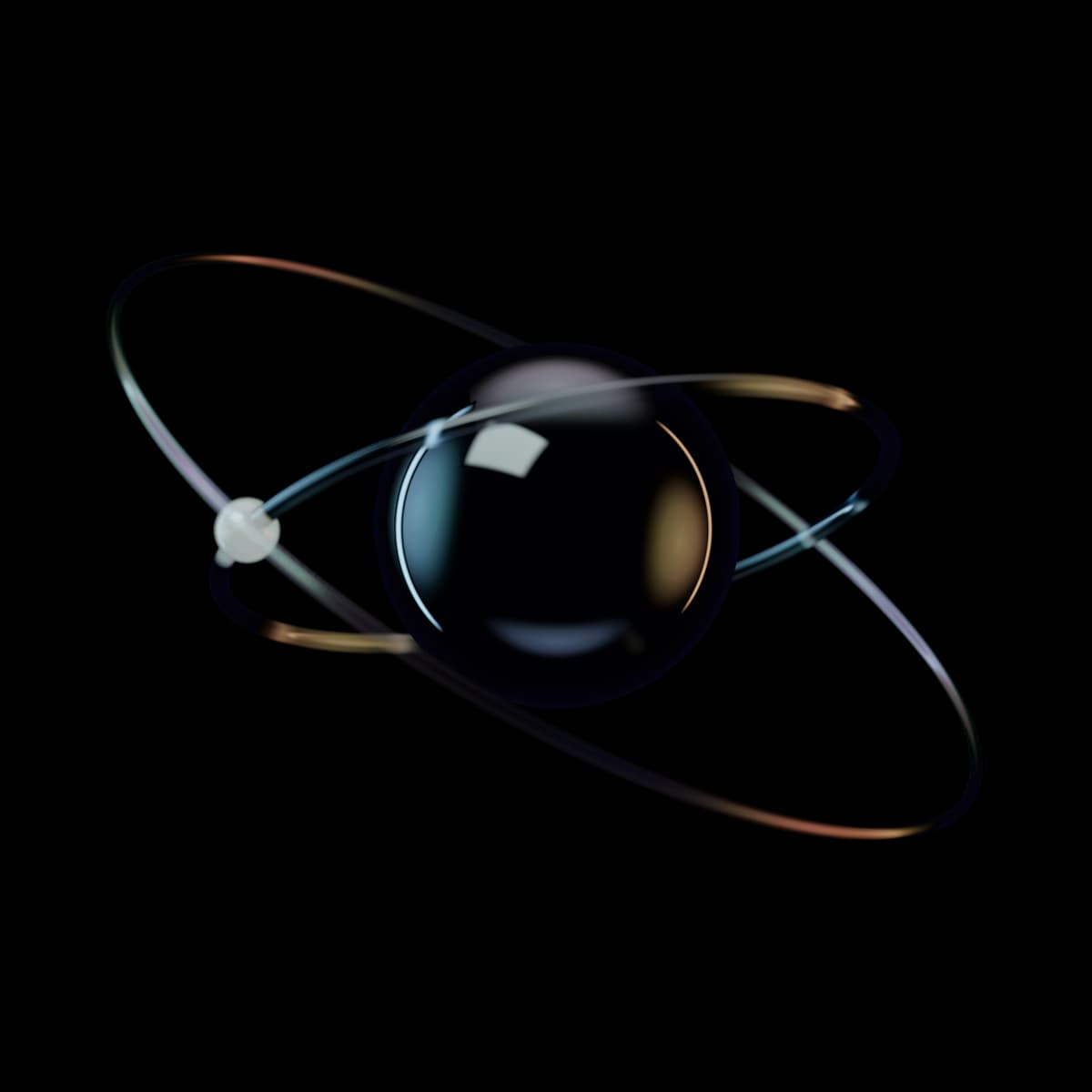 A clear glass sphere with two hairline glass rings in orbit around it and a small bead traveling on the inner ring.