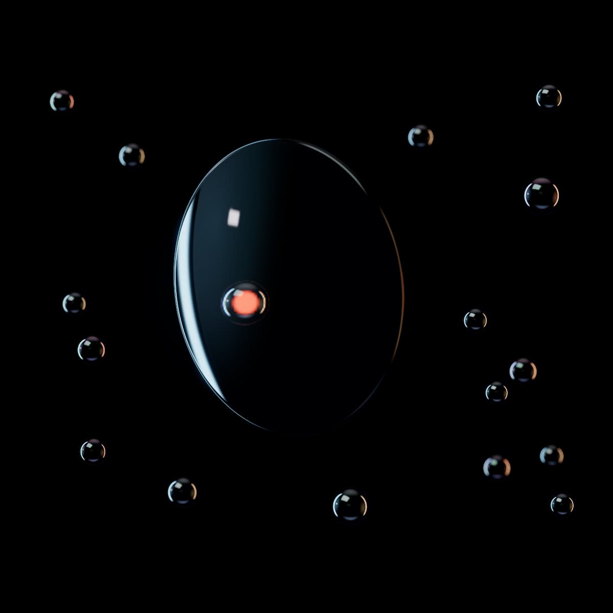 A large clear glass lens in front of a scattered field of small glass beads, with a glowing orange bead seen sharp and magnified through the lens.